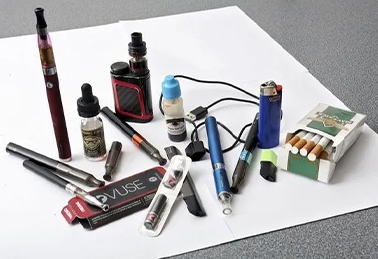 A Variety of vaping products set on a table